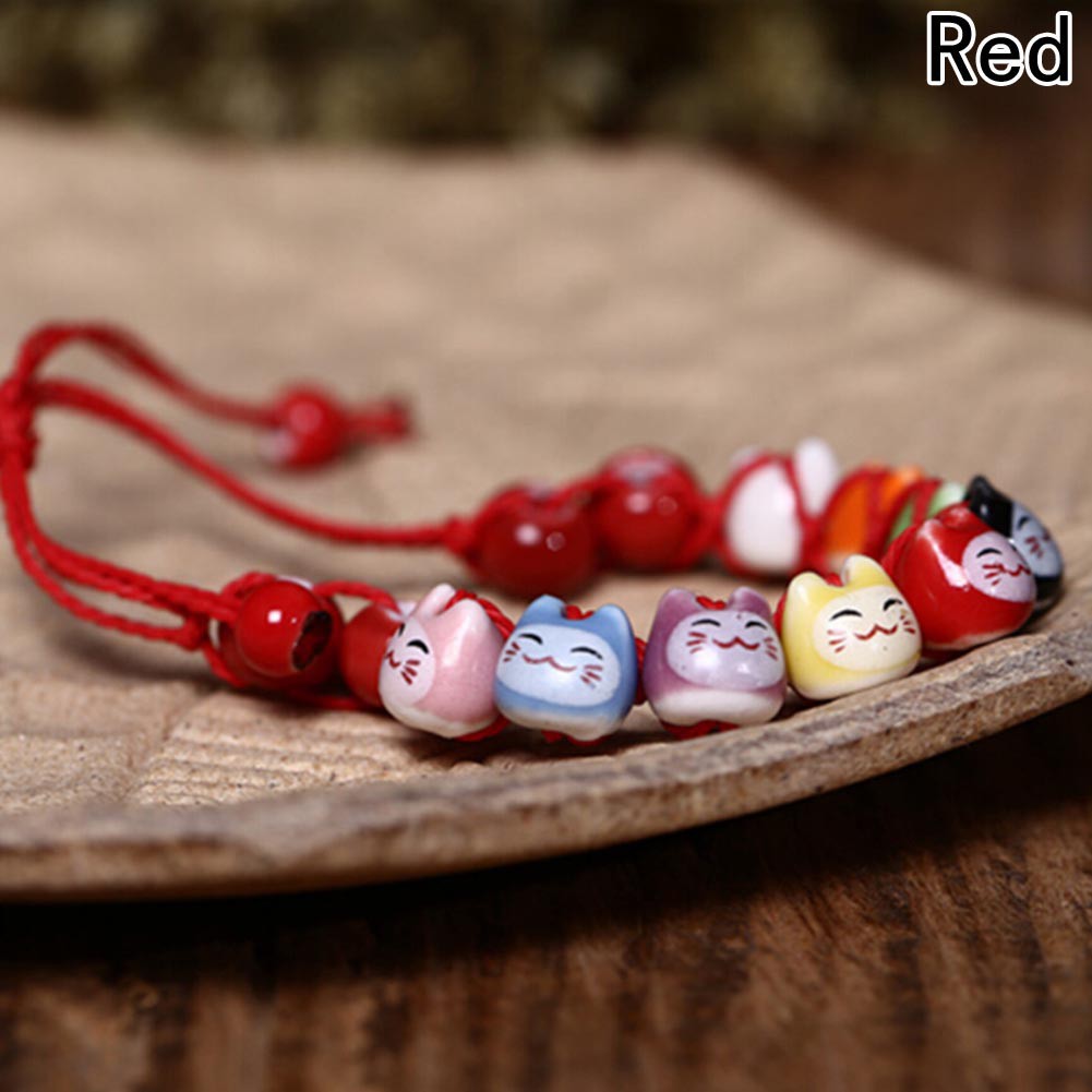 Vòng tay mặt hình mèo bằng gốm thủ công sành điệu
