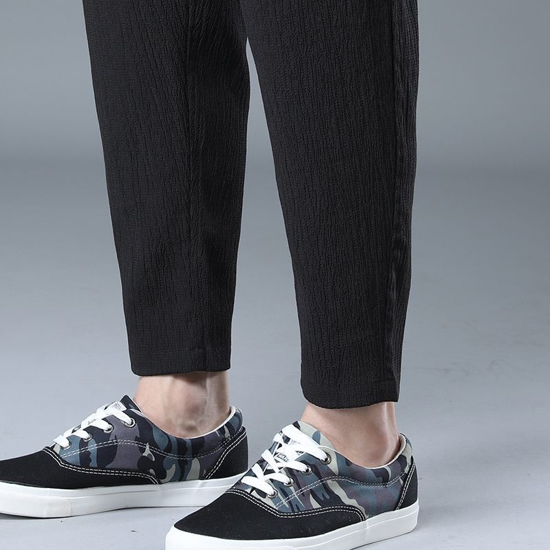 Quần thể thao mỏng bằng vải lụa lạnh ống rộng thoáng khí thời trang mùa hè dành cho nam