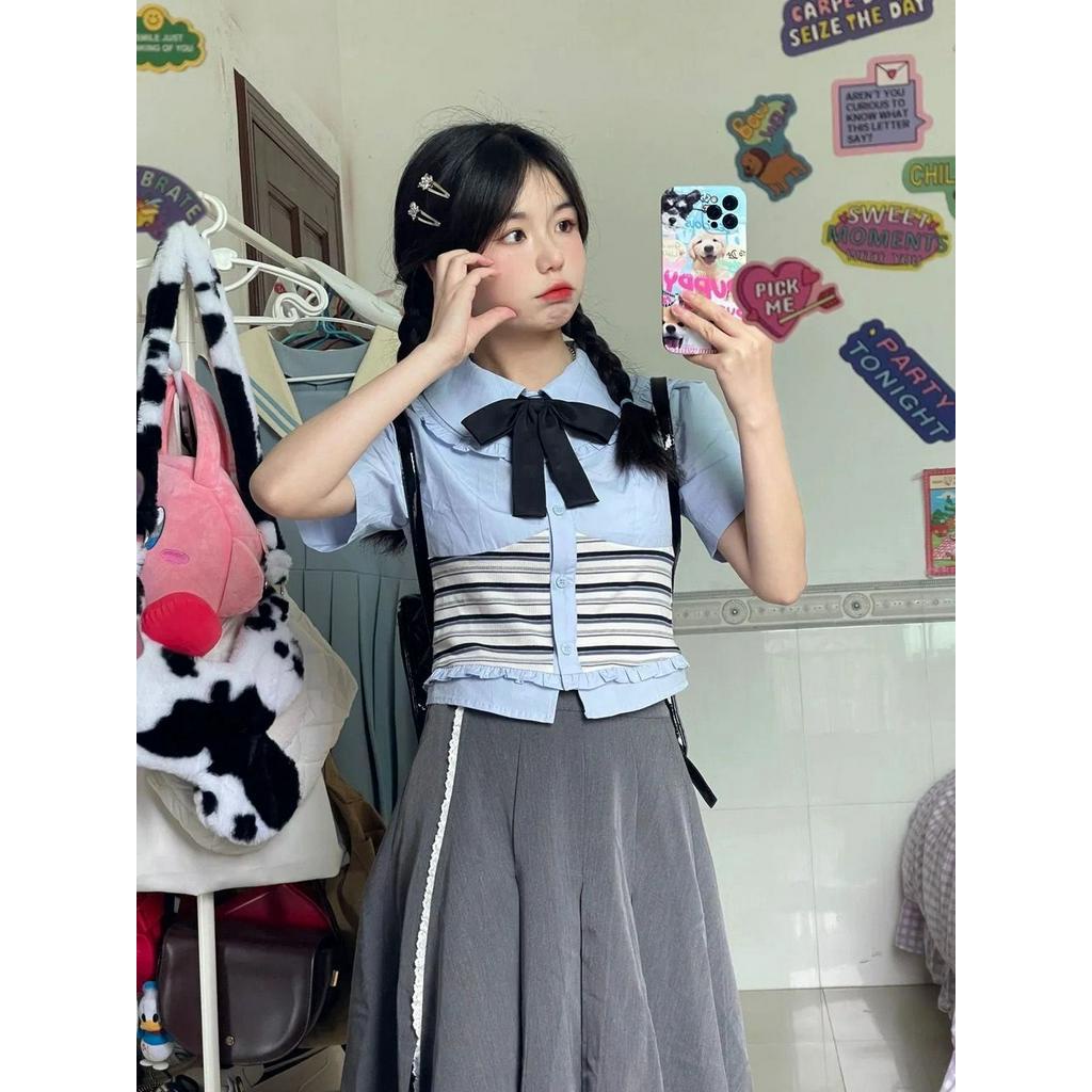 Bộ đồ thời trang dành cho sinh viên áo sơ mi ngọt ngào trên mặc áo liền quần eo cao ôm sát váy dài vừa phải xếp ly có