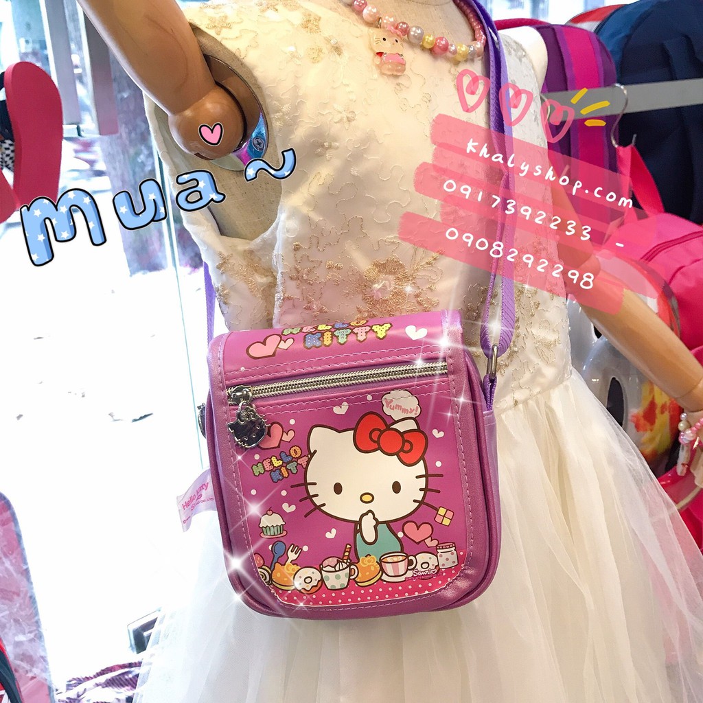 Túi đeo chéo vuông hình mèo Hello Kitty bánh kẹo màu tím đậm cho bé gái (Thái Lan) - 2906KT02402 - (15x5x15cm)