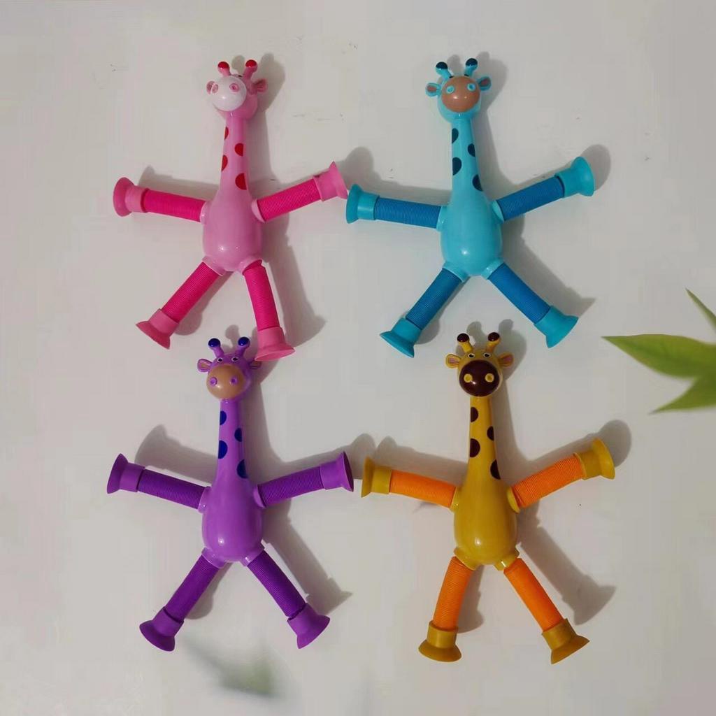 Đồ chơi Lò xo hươu cao cổ có ống hút dính . hươu lò xo kéo dãn đèn sáng