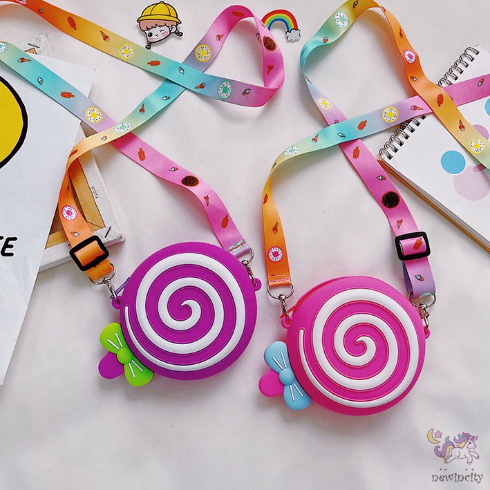 Túi đeo chéo hình kẹo mút đáng yêu dành cho bé gái