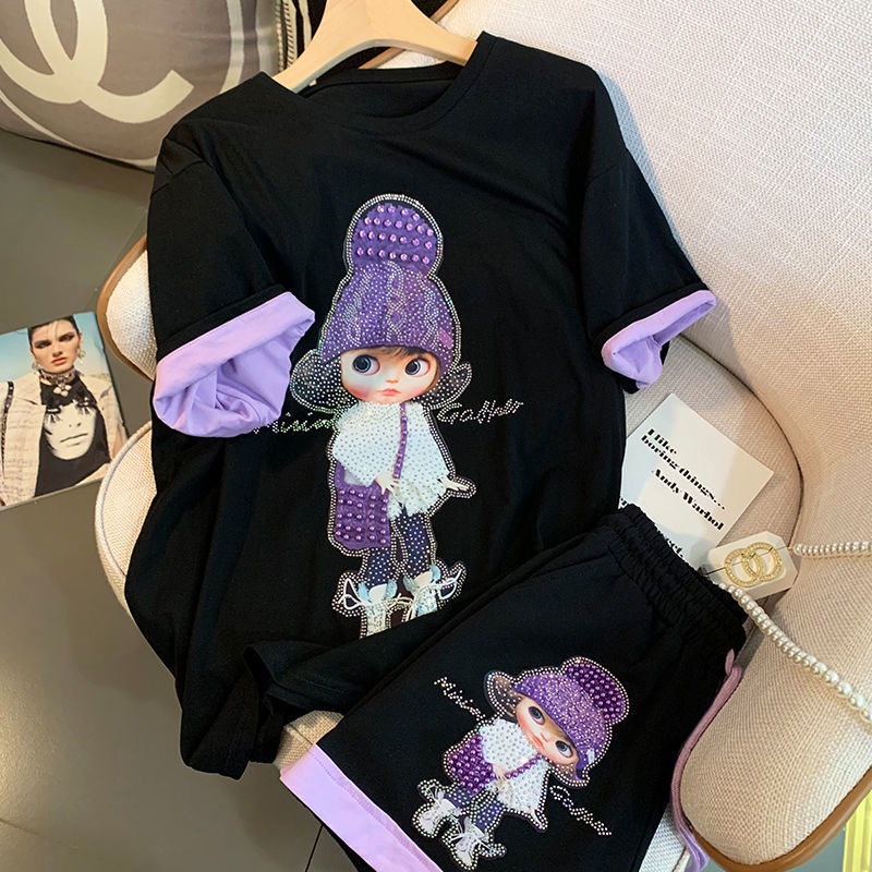 Trang phục áo thun tay ngắn và quần short ống rộng mỏng in hình cô gái đội mũ màu tím kiểu mùa hè cho nữ