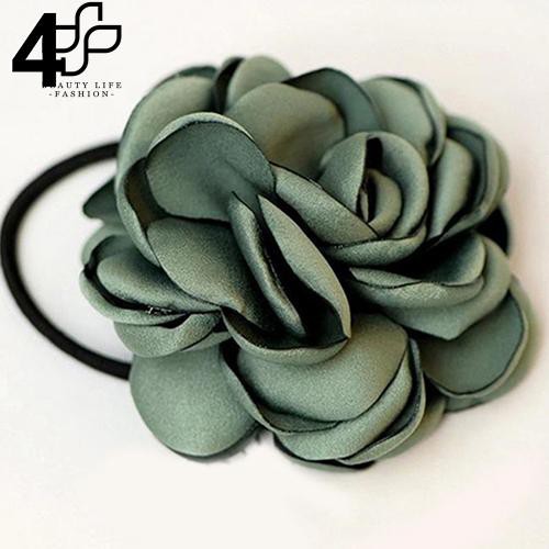 Cột tóc hình bông hoa trà