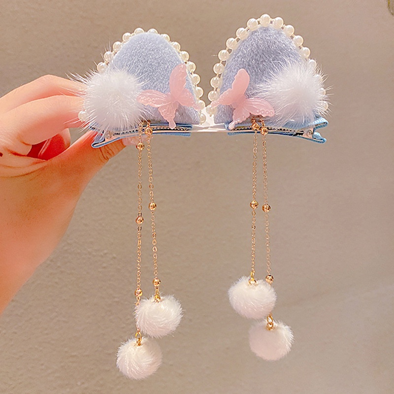 Kẹp tóc hình tai thỏ phối tua rua xinh xắn cho bé gái