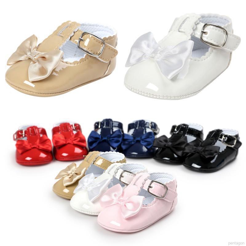 Giày sandal bít mũi phối nơ xinh xắn cho bé