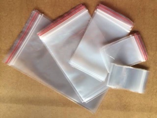 Set 2kg túi zip chỉ đỏ 4size