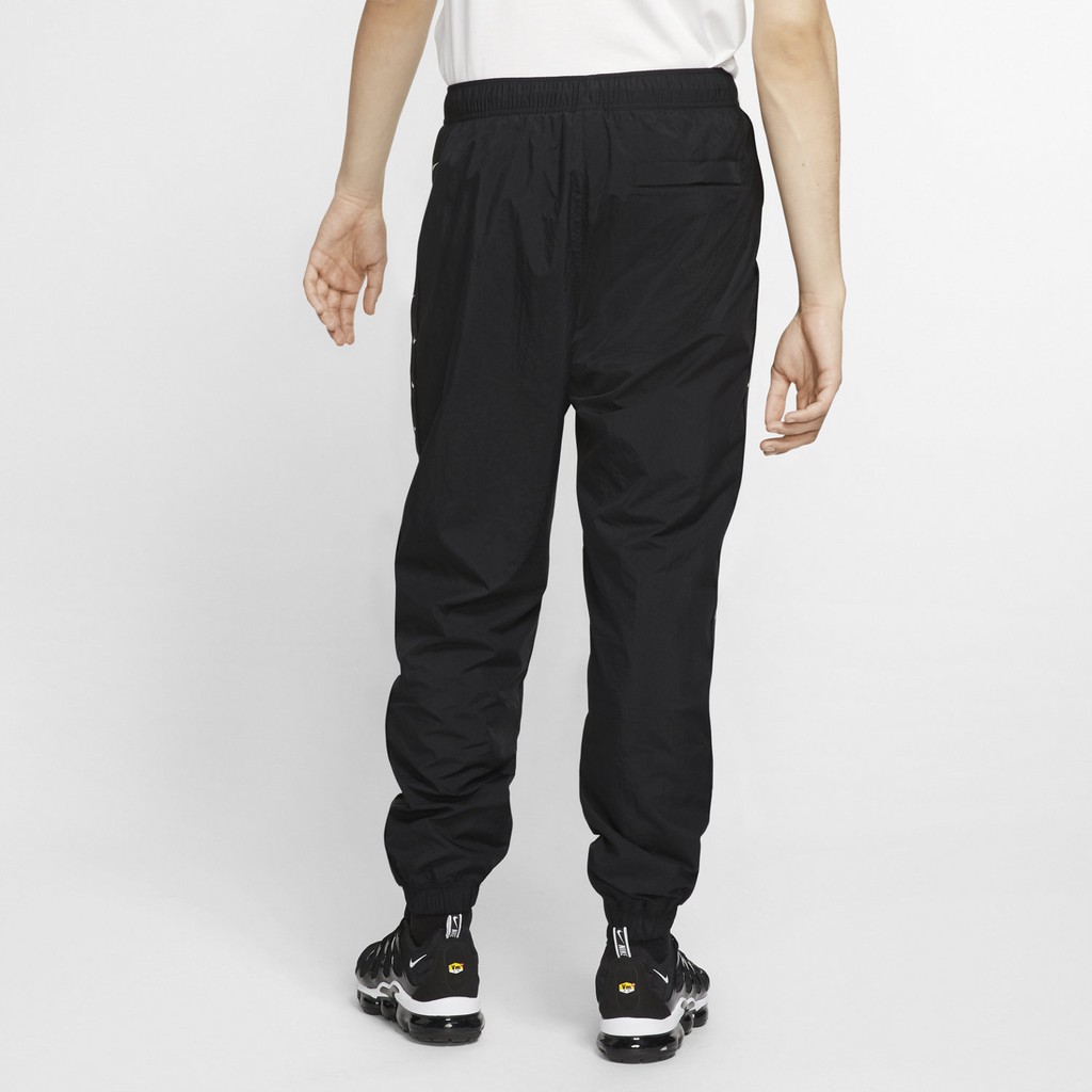 QUẦN DÀI NIKE SWOOSH TAPED SWOOSH POPOVER PANTS - ĐEN /TRẮNG