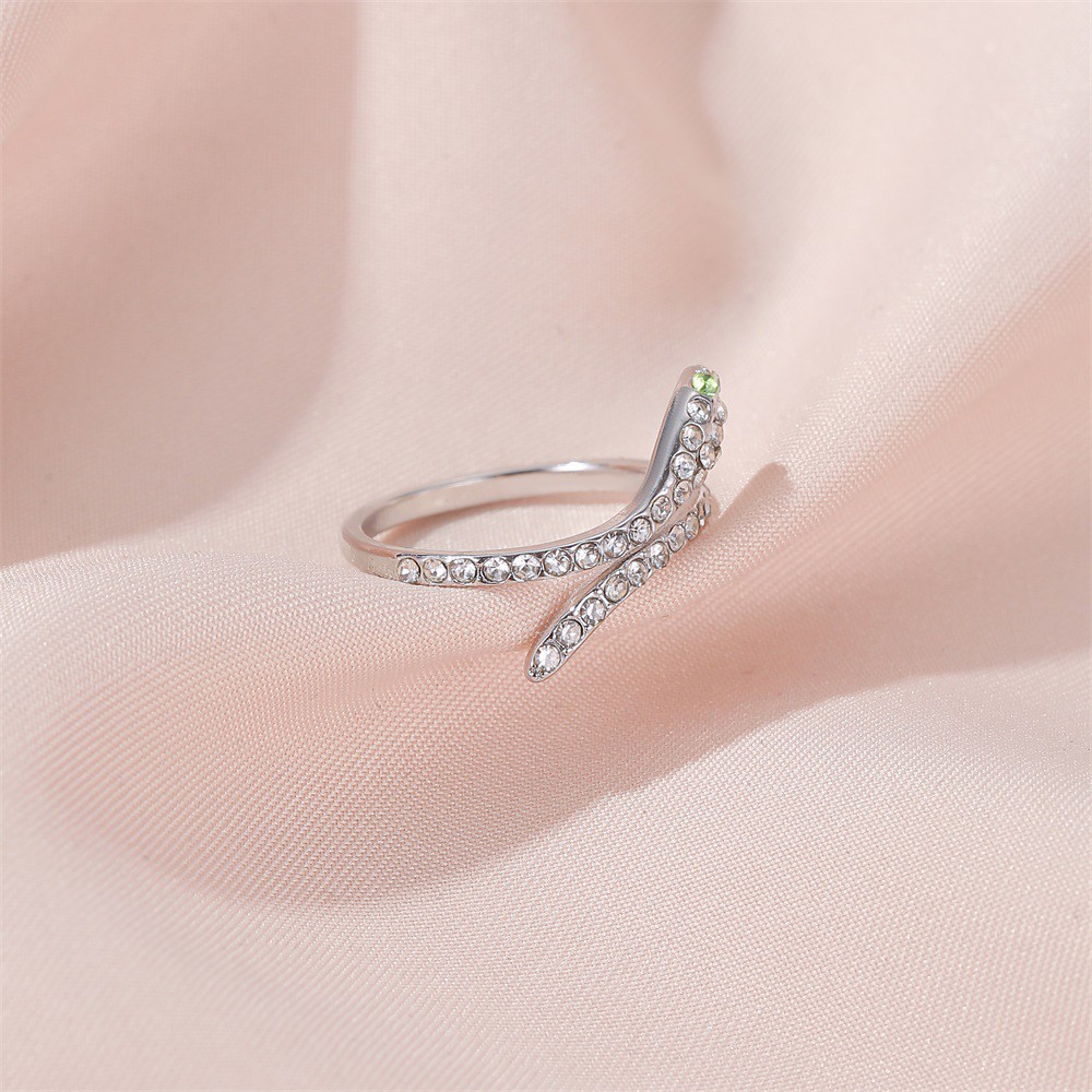 Serpentine Zircon Diamond Rings