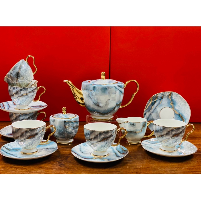 phụ kiện nhà bếp màu xanh cao cấp. chén đĩa màu xanh nước biển. bộ ấm trà, đĩa hoa quả bánh kẹo sứ xương cao cấp