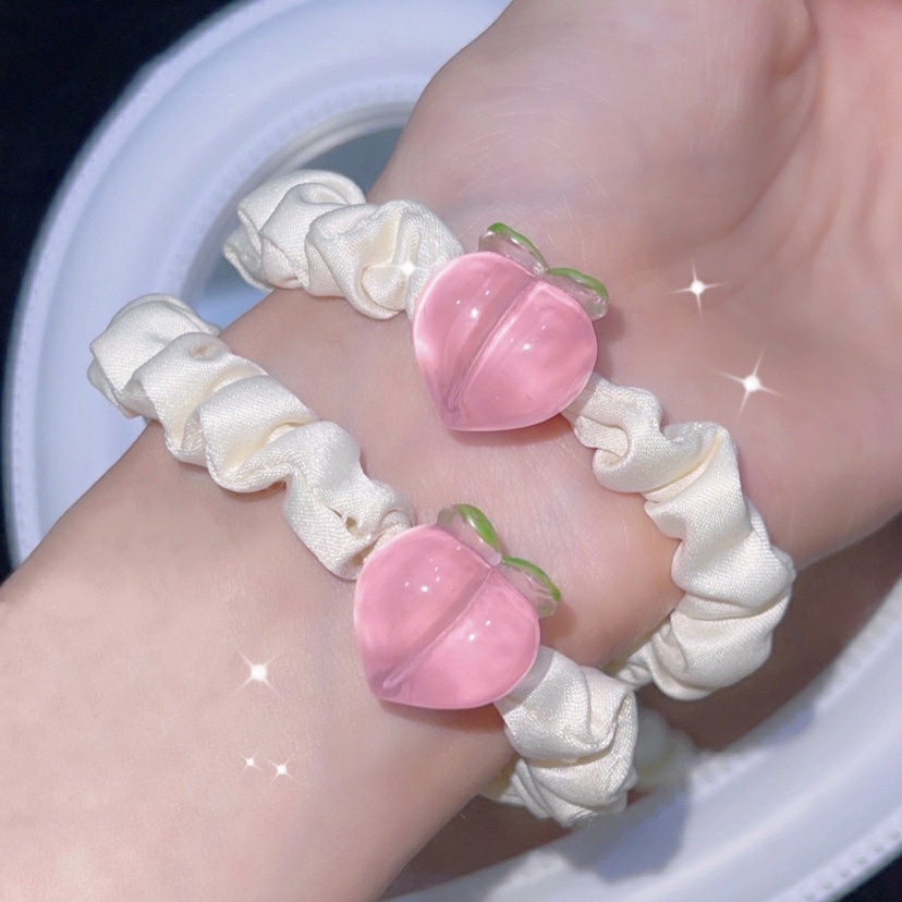Cột Tóc Vải Nhún Đính Charm Phô Mai Đào Sanrio Pastel