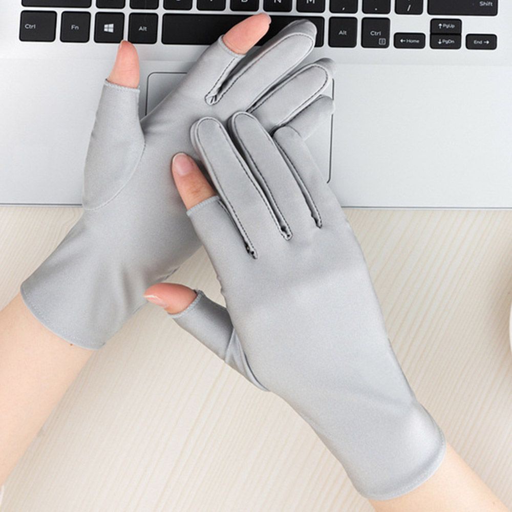Đôi găng tay hở ngón mềm mại thoáng khí chống tia UV cho nam nữ