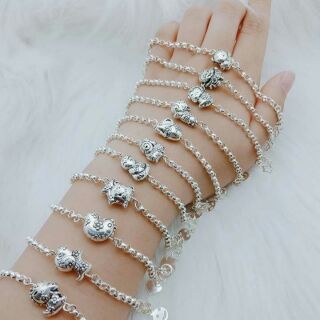Lắc con giáp bạc sơn đen cho bé. S