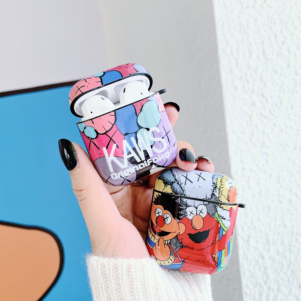 Vỏ bảo vệ hộp sạc tai nghe Airpods 1 / 2 mềm họa tiết Kaws Sesame Street kèm dây đeo