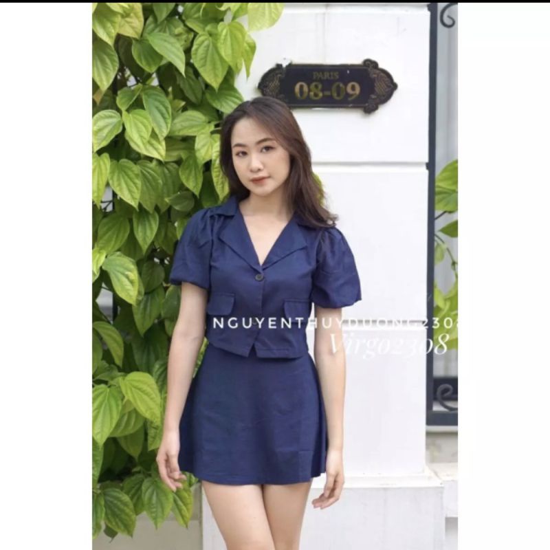 Set áo vest tay bồng bo chun và chân váy ngắn màu xanh đen , chất liệu vải mềm mịn mặc rất mát , free size 43kg-56kg