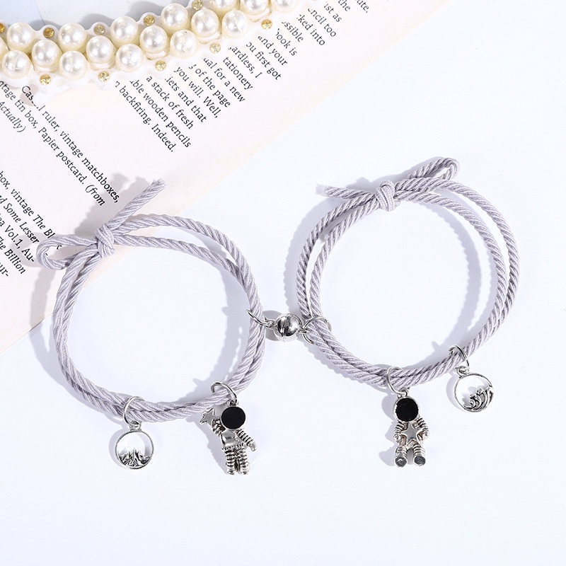 Cặp Vòng Tay Cao Su Mặt Hình Phi Hành Gia Độc Đáo