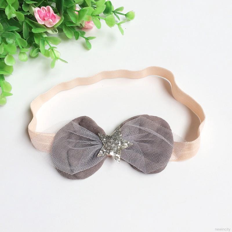 Băng đô cài tóc thắt nơ phối ngôi sao đính sequin dễ thương cho bé gái