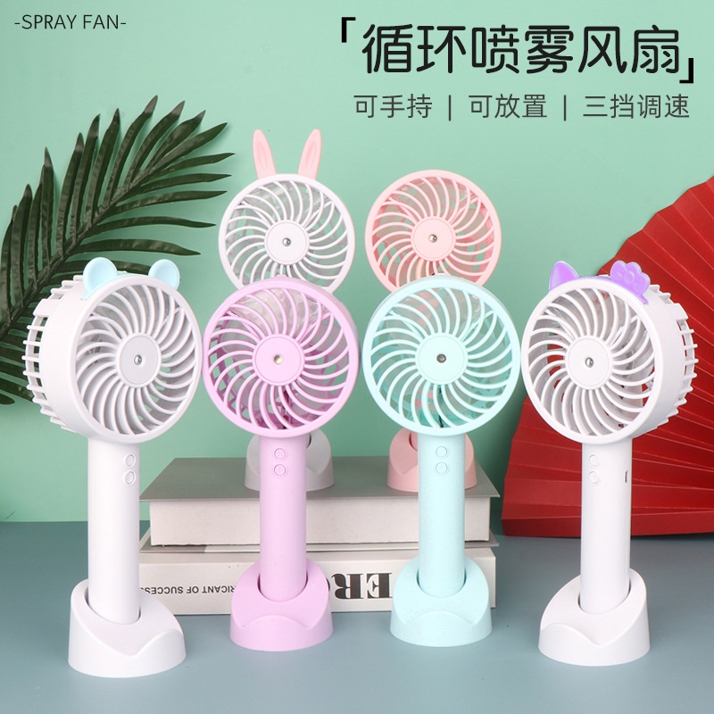 Quạt Phun Sương Cầm Tay Mini Có Giá Để Điện Thoại - Quạt Cầm Tay Mini Có Tích Hợp Chế Độ Phun Làm Mát Giải Nhiệt Mùa Hè