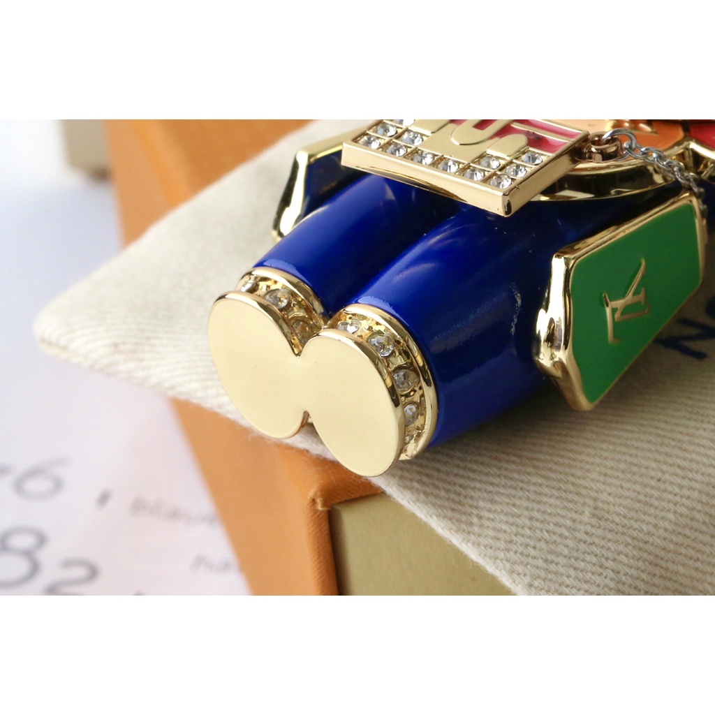 Móc Khóa Hình Hoa Hướng Dương LV Màu Vàng Tương Phản