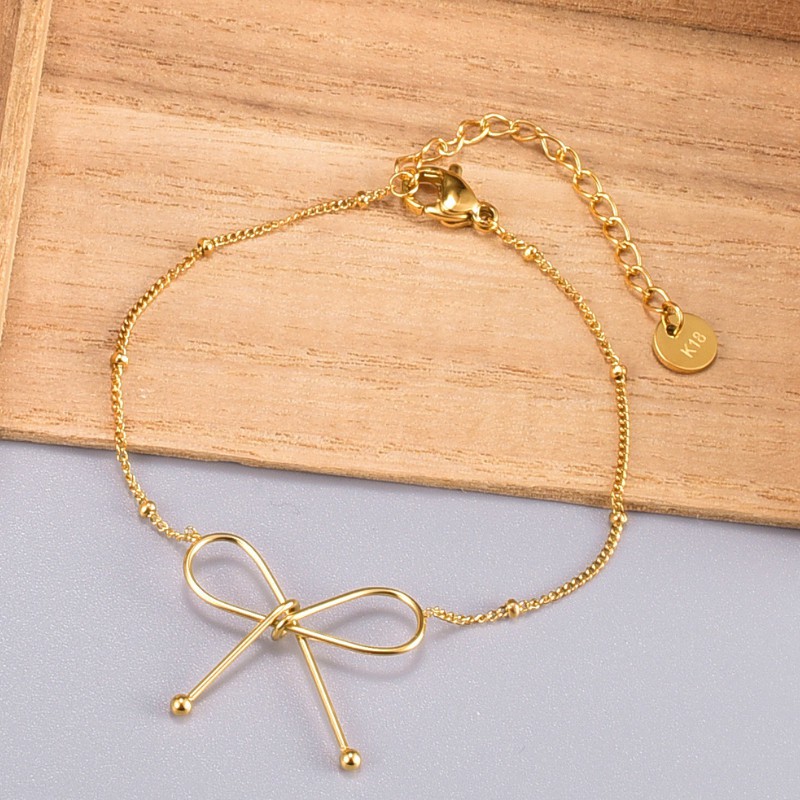 Lắc Tay Nữ Nơ Xinh Titan Ko Đen TT 3737