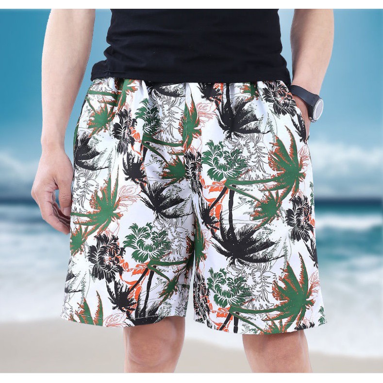 Quần sooc nam họa tiết cây dừa, lá hoa, mặc đi biển, mặc ở nhà, phom ống rộng thoải mái, chất liệu vải mềm mại, freesize
