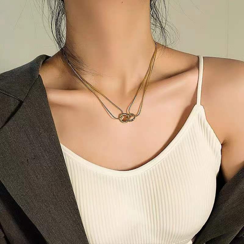 Dây chuyền ngắn thép titan xương rắn phối mặt có họa tiết lồng vào nhau không phai màu không gây dị ứng cao cấp cho nữ