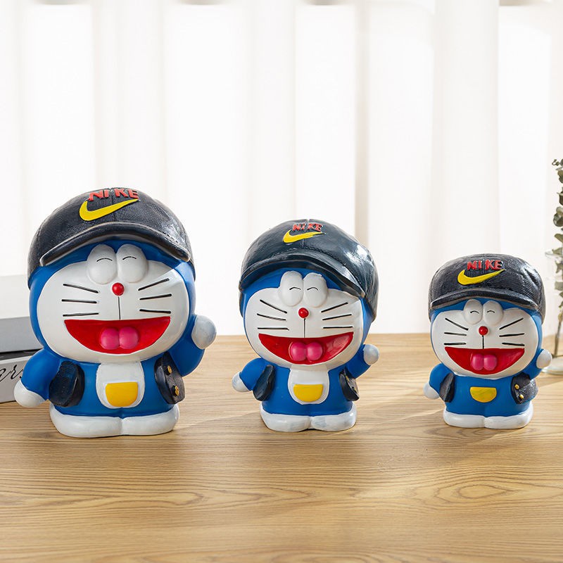Ống Heo Tiết Kiệm Chống Rơi Hình Mèo Máy Doraemon Sáng Tạo Cho Bé Trai