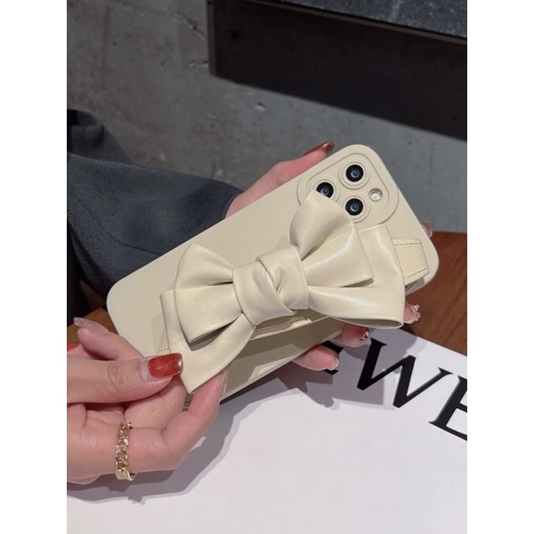 Ốp lưng i.phone trang trí nơ đeo tay