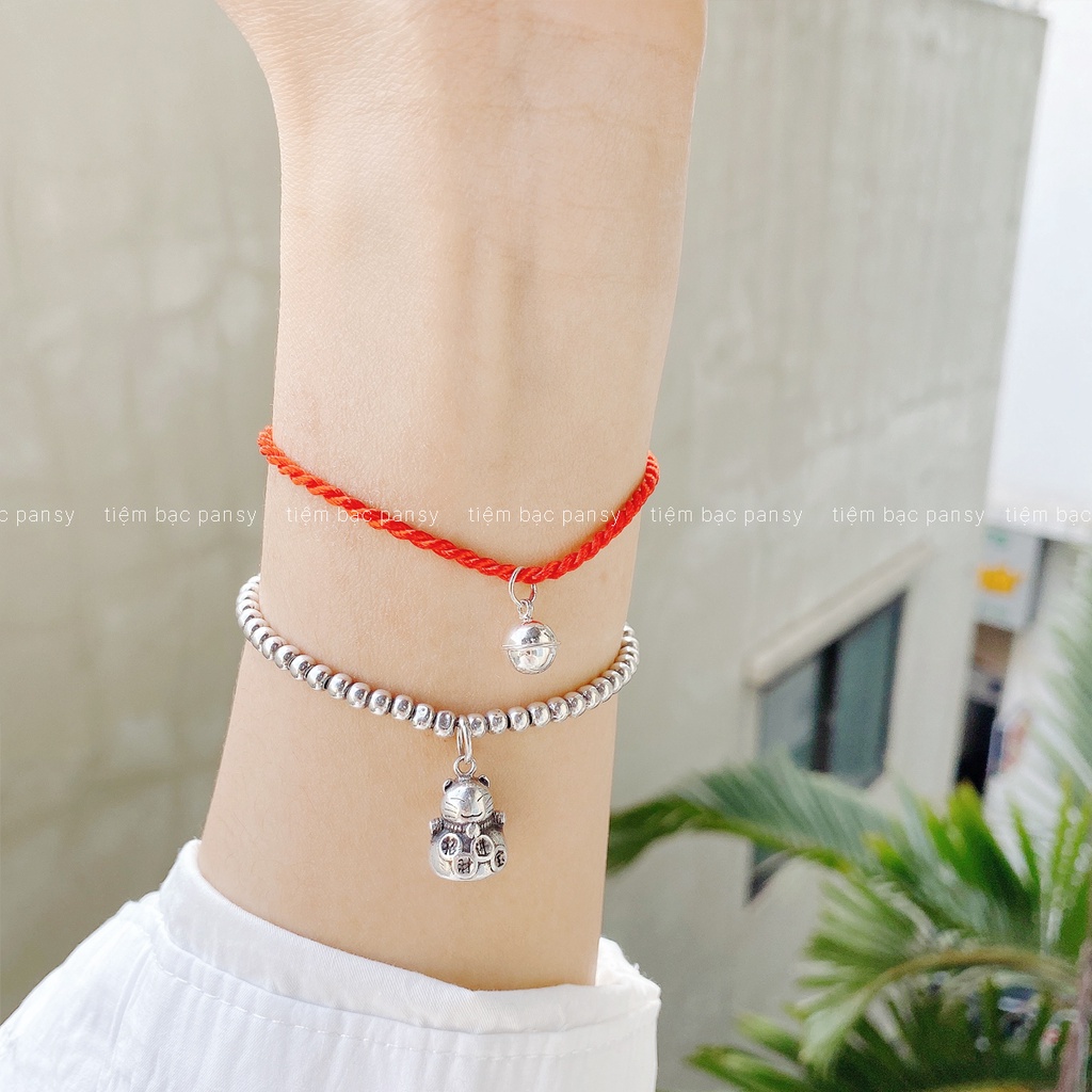 Vòng tay chỉ đỏ mix chuông bạc PANSY may mắn, an nhiên. Vòng tay handmade dây lụa xoắn cho người lớn, trẻ em