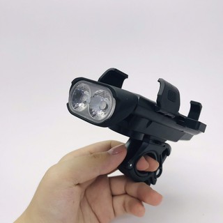 ĐÈN PHA ĐA NĂNG 4 IN 1 ( đen+coi+giá để điện thoại+sạc dự phòng điện thoại)