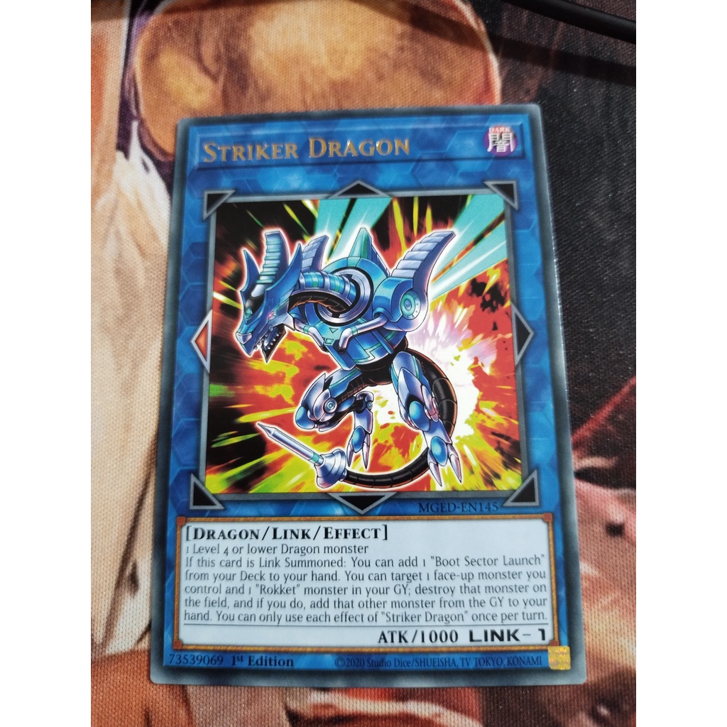 Thẻ trò chơi Yugioh chính hãng Konami UK Striker Dragon - MGED-EN145 - Rare 1st Edition