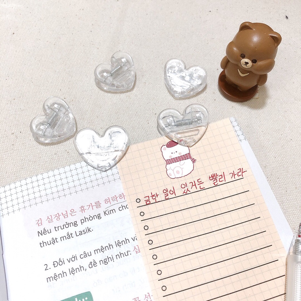 KẸP GIẤY TRONG SUỐT TRÁI TIM