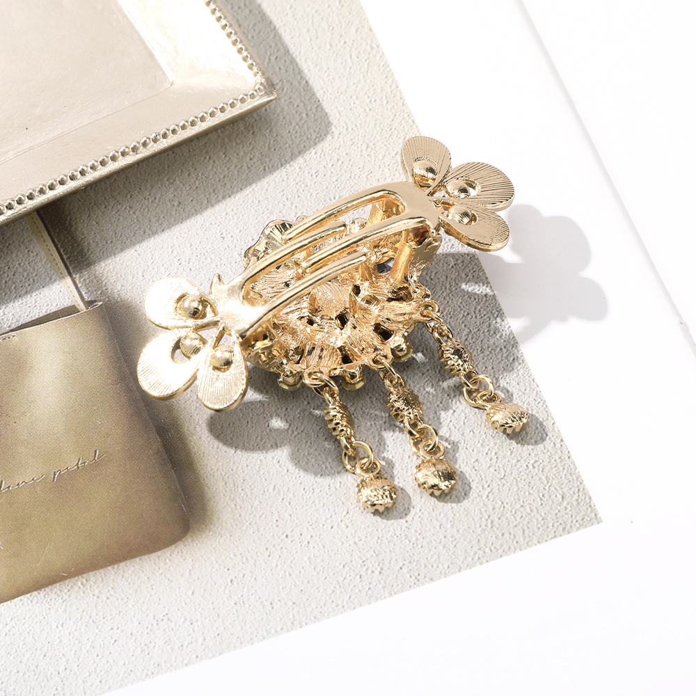 Kẹp tóc hình hoa đính đá phong cách vintage xinh xắn