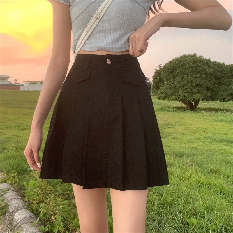 Chân váy tenis chất liệu kaki cúc giữa trẻ trung | BigBuy360 - bigbuy360.vn