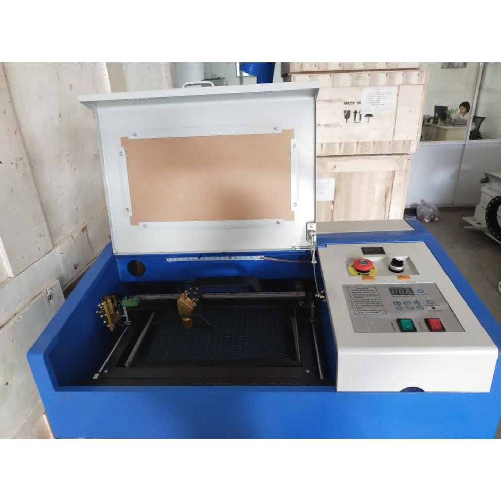 Máy cắt khắc laser model YH-3020 khắc tem trên vật liệu phi kim loại như tem sừng bò, gỗ, con dấu nhựa đỏ,pha lê,..