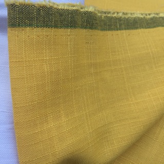 Vải linen tưng gân màu vàng cúc tông trầm.