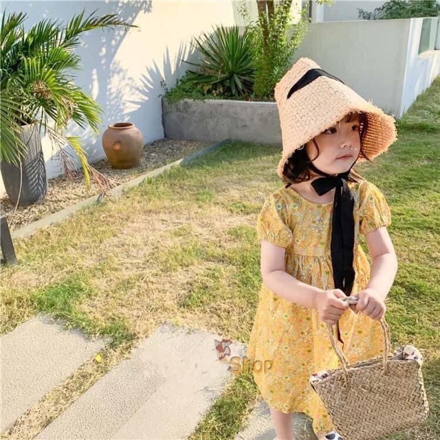 Váy nhí hoa vàng Đan lưng siêu hot