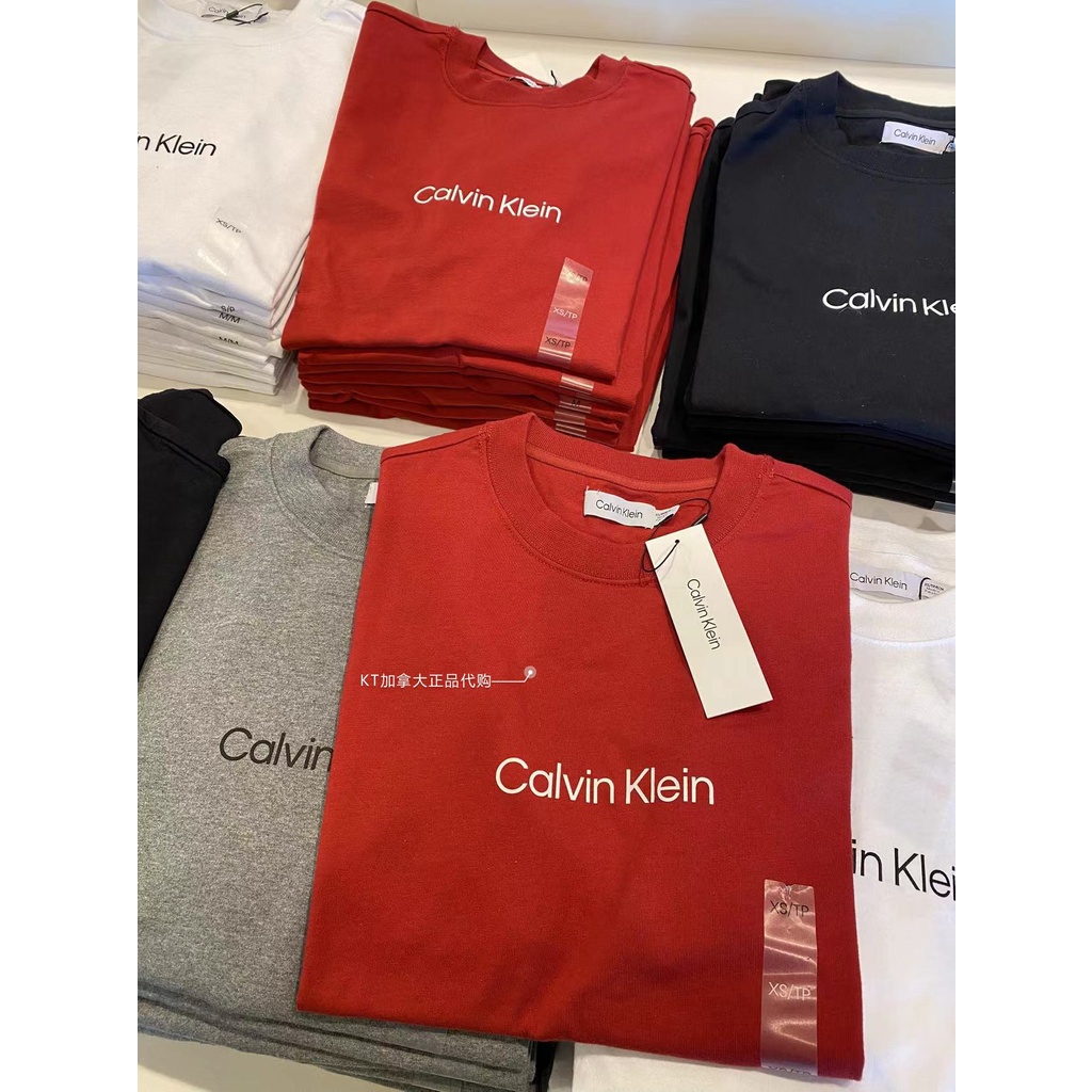 Áo Thun Cotton Ngắn Tay Cổ Tròn In Logo Calvin Klein Cá Tính Cho Nam