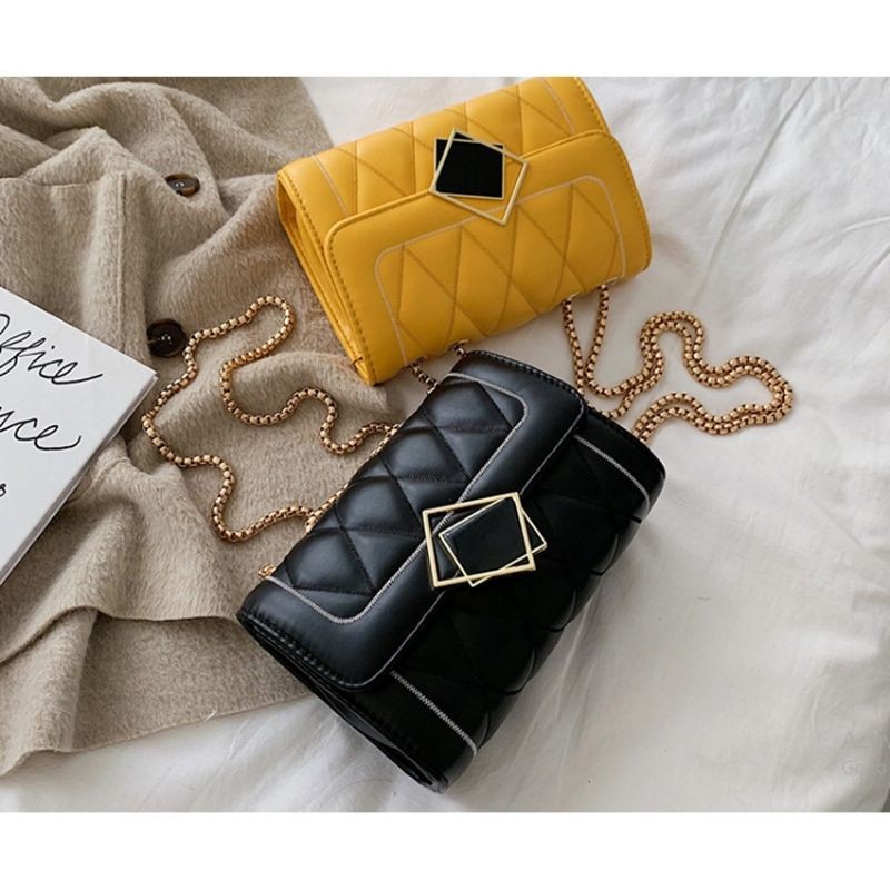 Túi đeo chéo trần trám khóa kính màu hồng