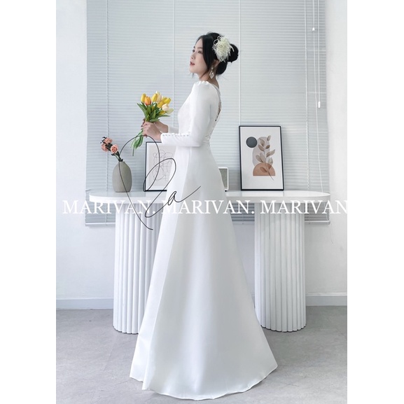 Đầm cưới MARIVAN cổ thuyền tay Ngọc lưng đính 5 chuỗi Ngọc siêu sang siêu xinh