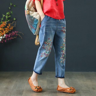 Women's jeans are plain, embroidered with personality tear patterns