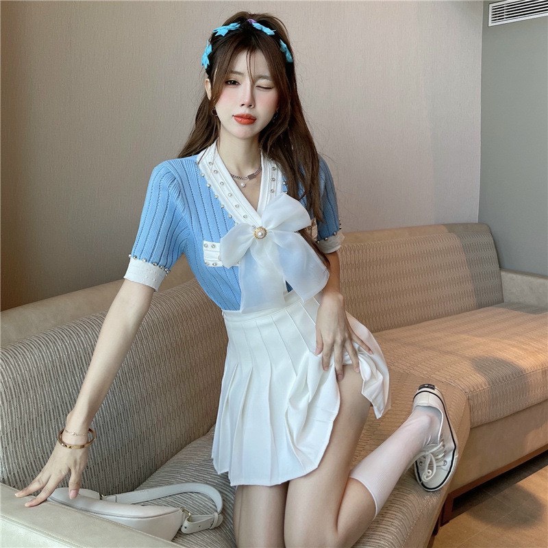 Áo len cổ đính nơ tiểu thư