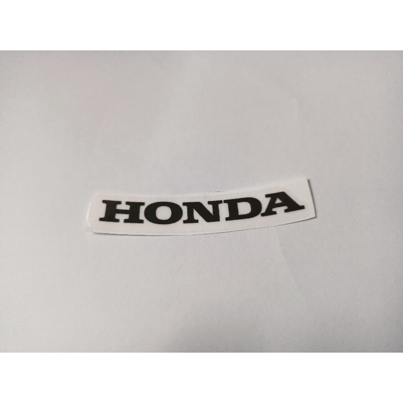 Tem trang trí mặt nạ xe Honda màu đen nền trong