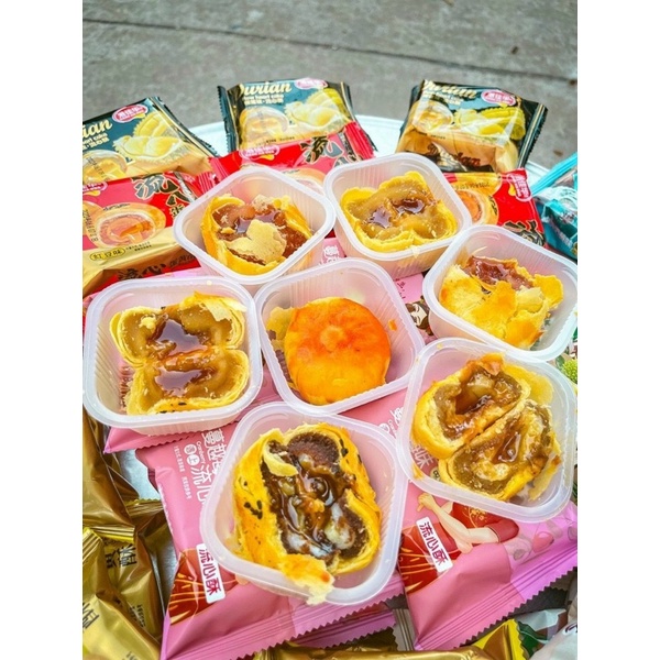 1 cái bánh pía trứng chảy mix 7 vị ( mã mới thùng 2.5kg )