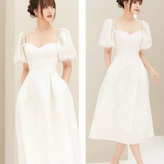 Đầm trắng tay phồng phối đan dây