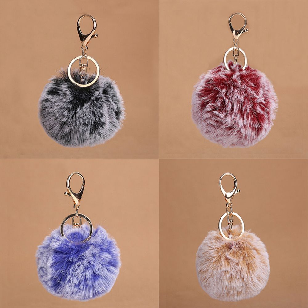 Móc khóa hình cục bông nhiều màu sắc dễ thương