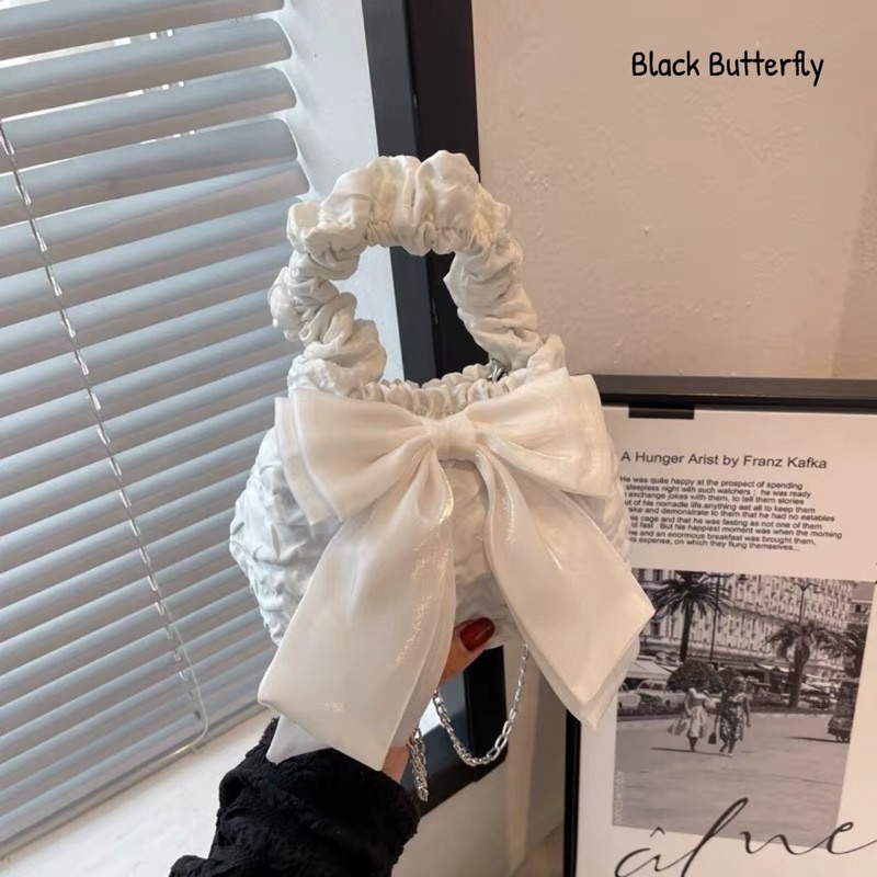 Túi đeo chéo đính nơ vải sần Butterfly