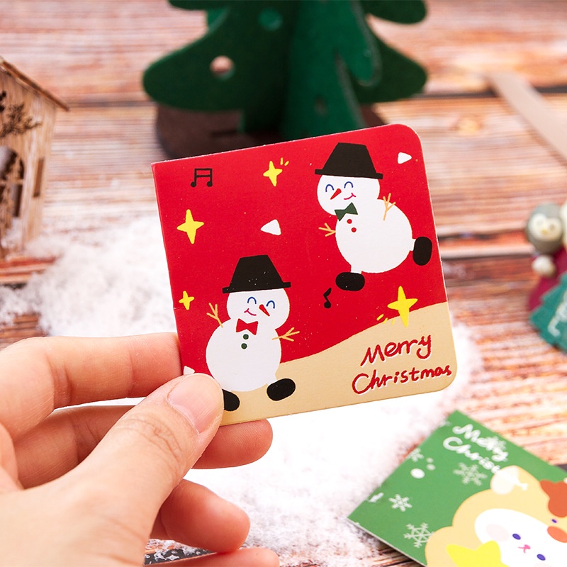 1 xấp giấy ghi chú hình hoa giáng sinh