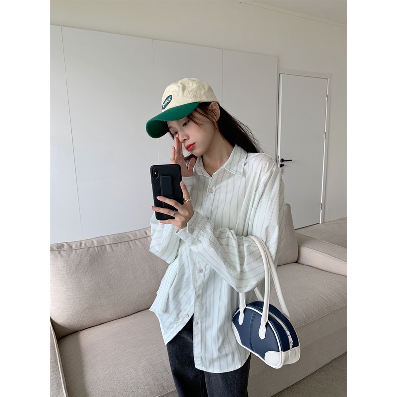 Áo sơ mi tay dài dáng rộng họa tiết kẻ sọc thời trang cho nữ | BigBuy360 - bigbuy360.vn