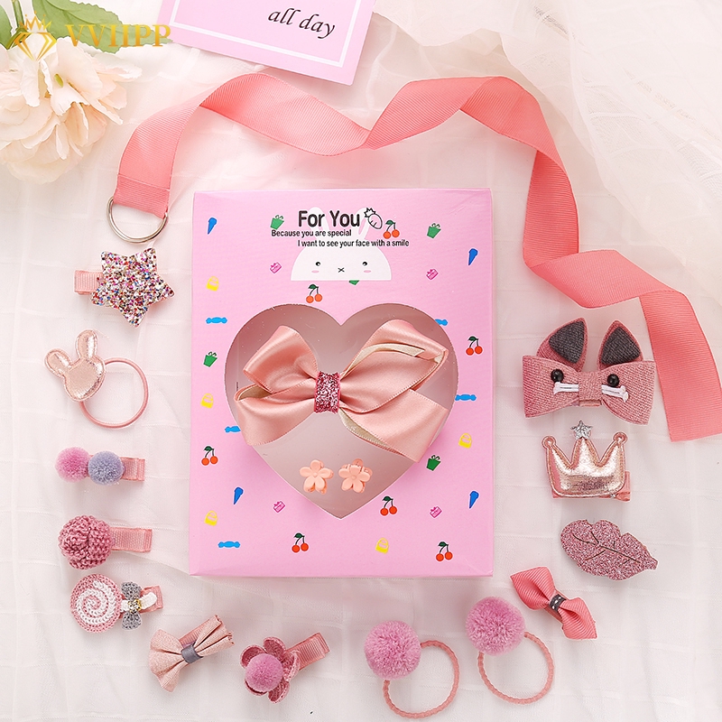 Hộp dây và kẹp tóc nhiều kiểu mềm mại tông hồng dùng làm quà sinh nhật cho bé gái